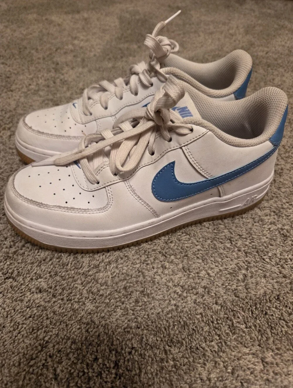 Nike Kids White Sneakers with Blue Swoosh